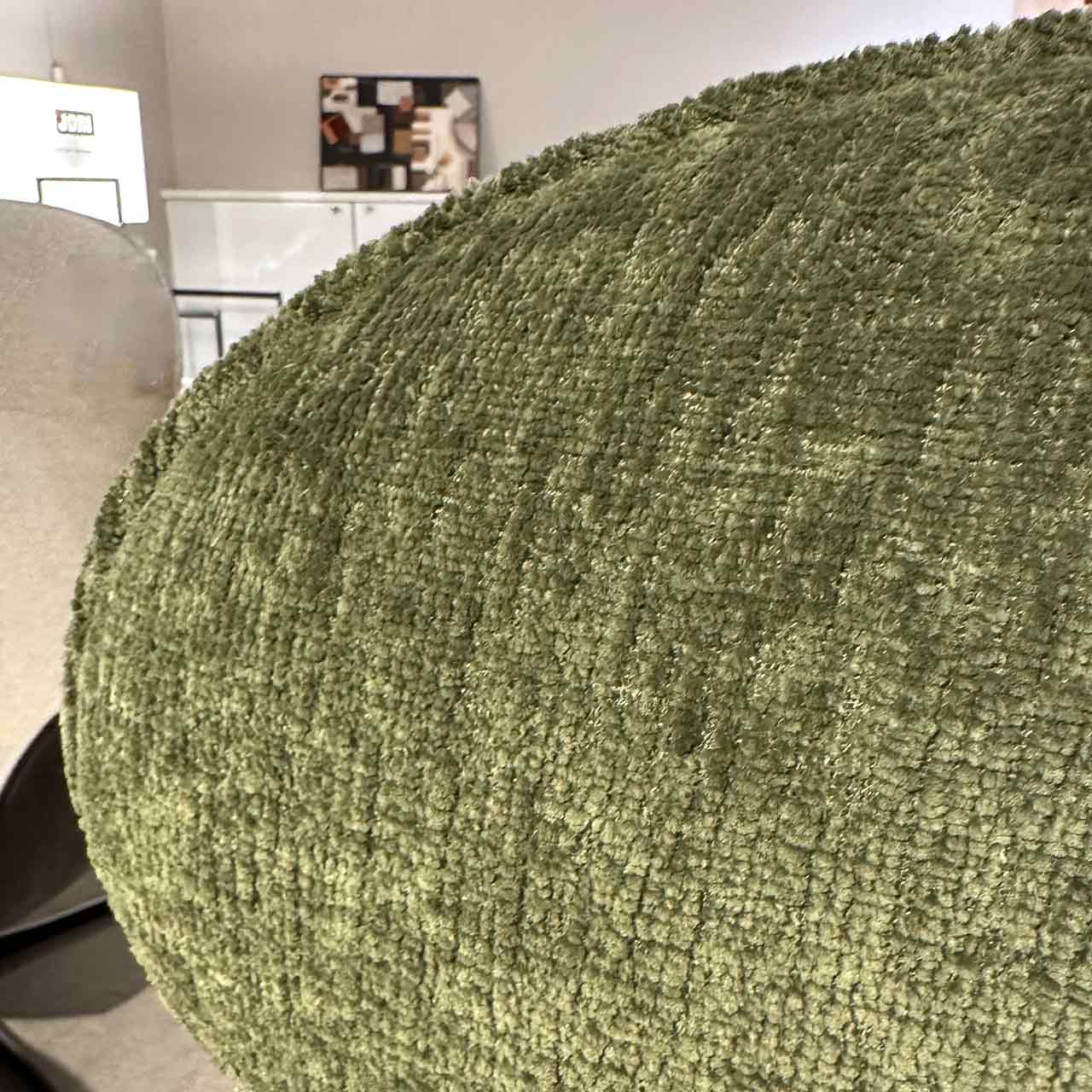 Detailaufnahme des grünen Stoffes.