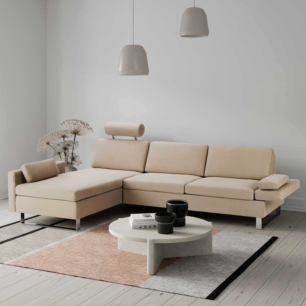 MH_Wohnzimmer_Sofas Stilvolles Ambientebild: Mit Ecksofa in beige mit modernem Couchtisch.