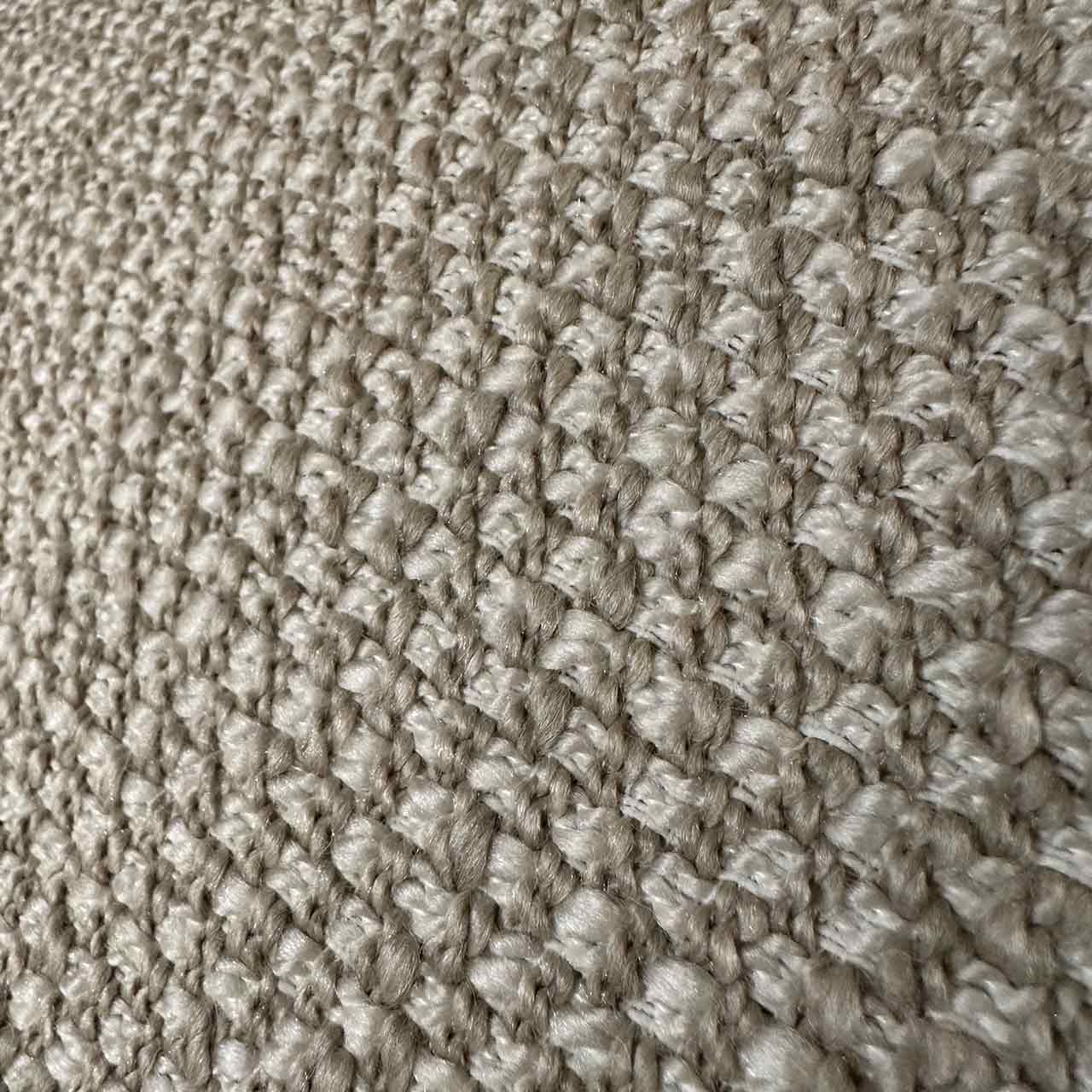 Detailaufnahme des Stoffes, die grobe Struktur ist sichtbar. 